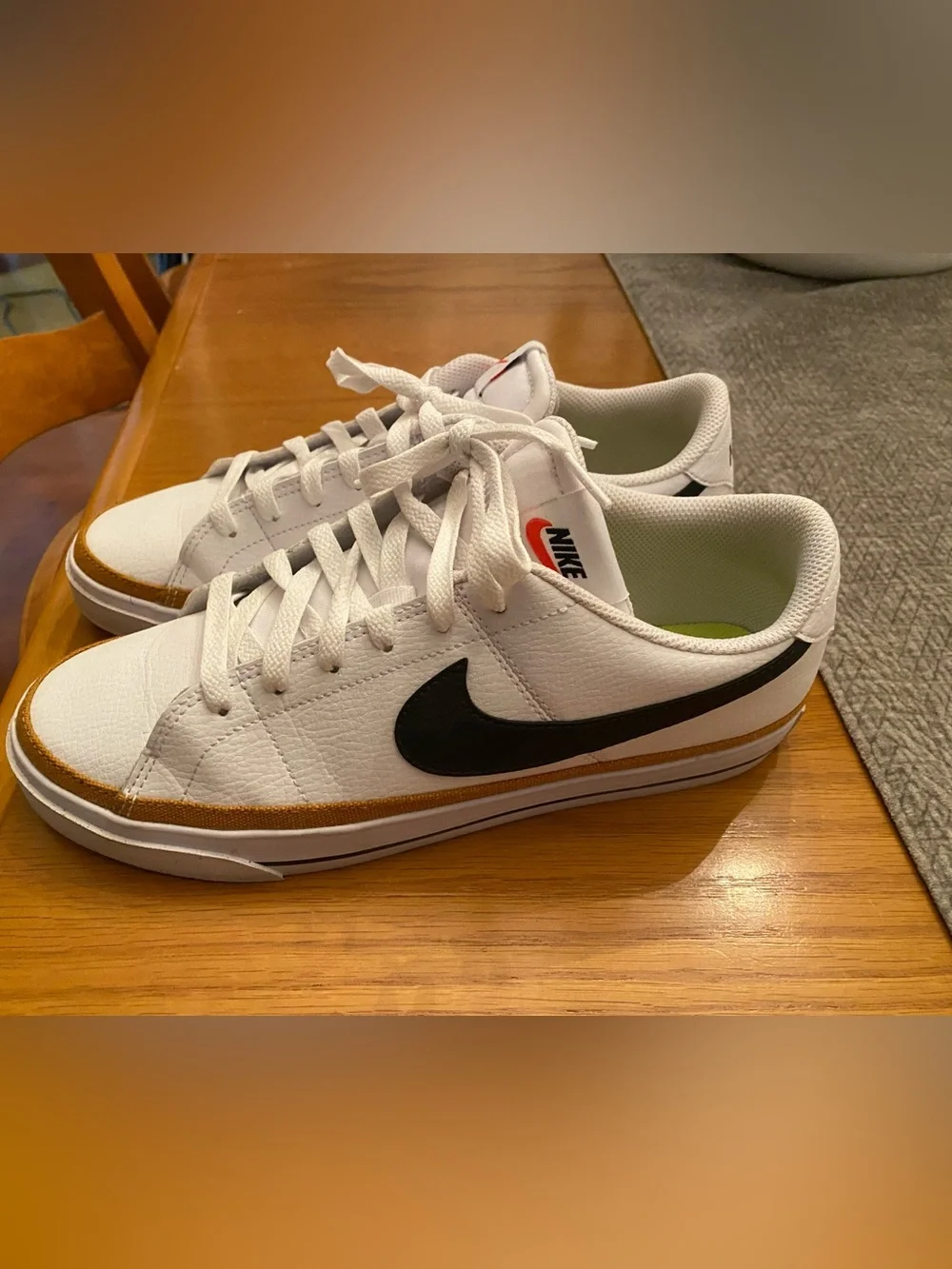 Nike Women’s  White Sneakers with Black Swoosh and Brown Trim